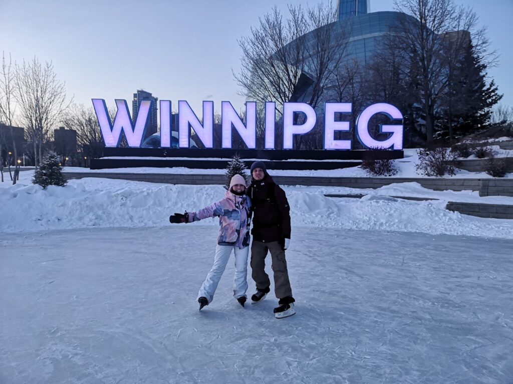 Winnipeg Manitoba City Forks TheForks Skating Ice IceSkating Skate Me Ceri Coat M&MC Sign WinnipegSign Etienne